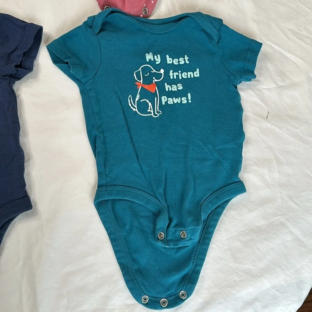 Carter’s bundle of 6 short sleeve baby girl onesies. They all have cute sayings.